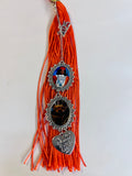 Tassel charm